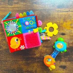 BUNDLE: Touch and Explore infant book + TOMY infant rattle